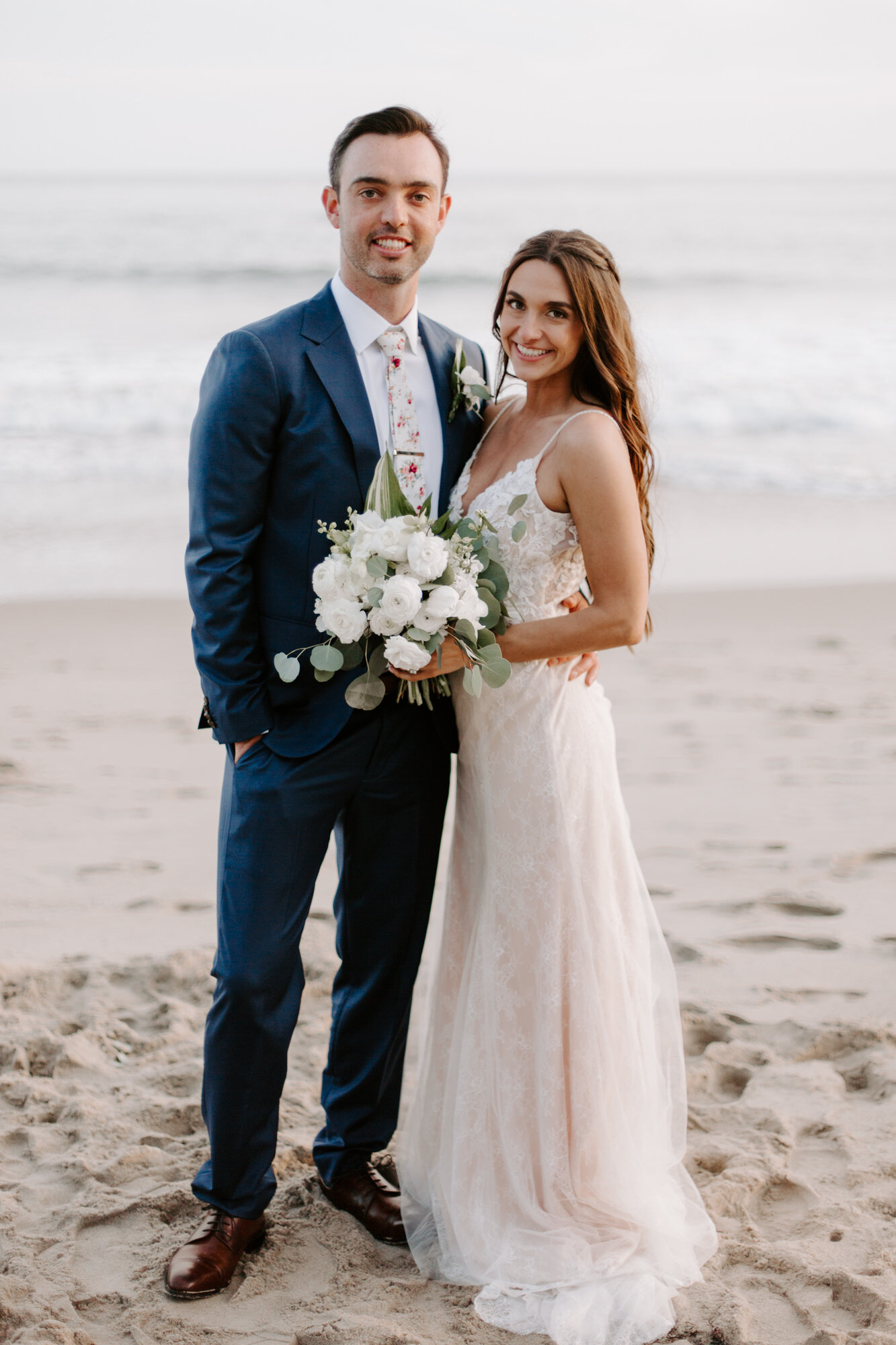 Malibu wedding photographed in Malibu california at a private home with a private beach.  Wedding photos were shot on the beach in Malibu.  This was a boho malibu wedding.  Malibu Wedding Photographer