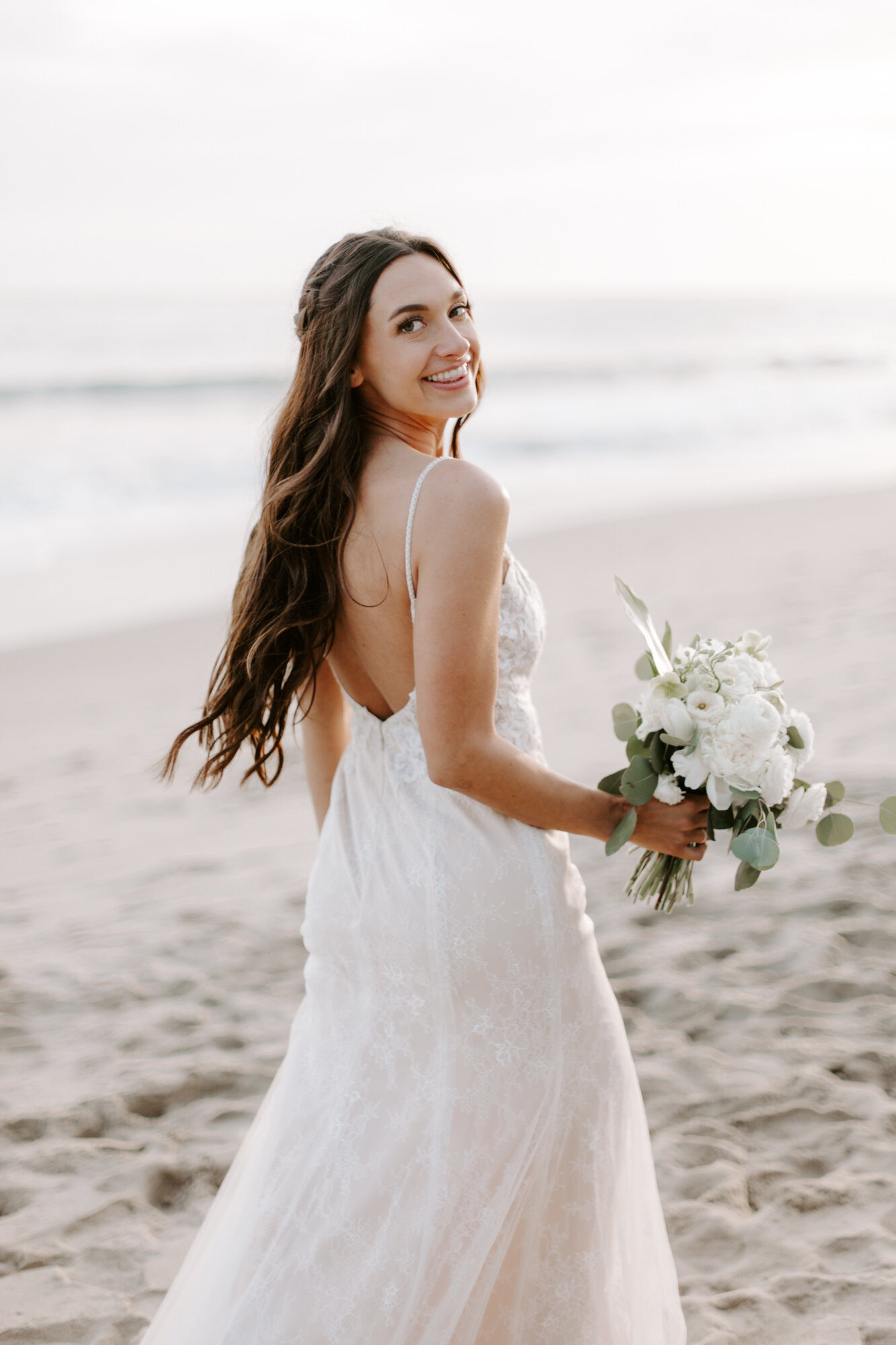 Malibu wedding photographed in Malibu california at a private home with a private beach.  Wedding photos were shot on the beach in Malibu.  This was a boho malibu wedding.  Malibu Wedding Photographer