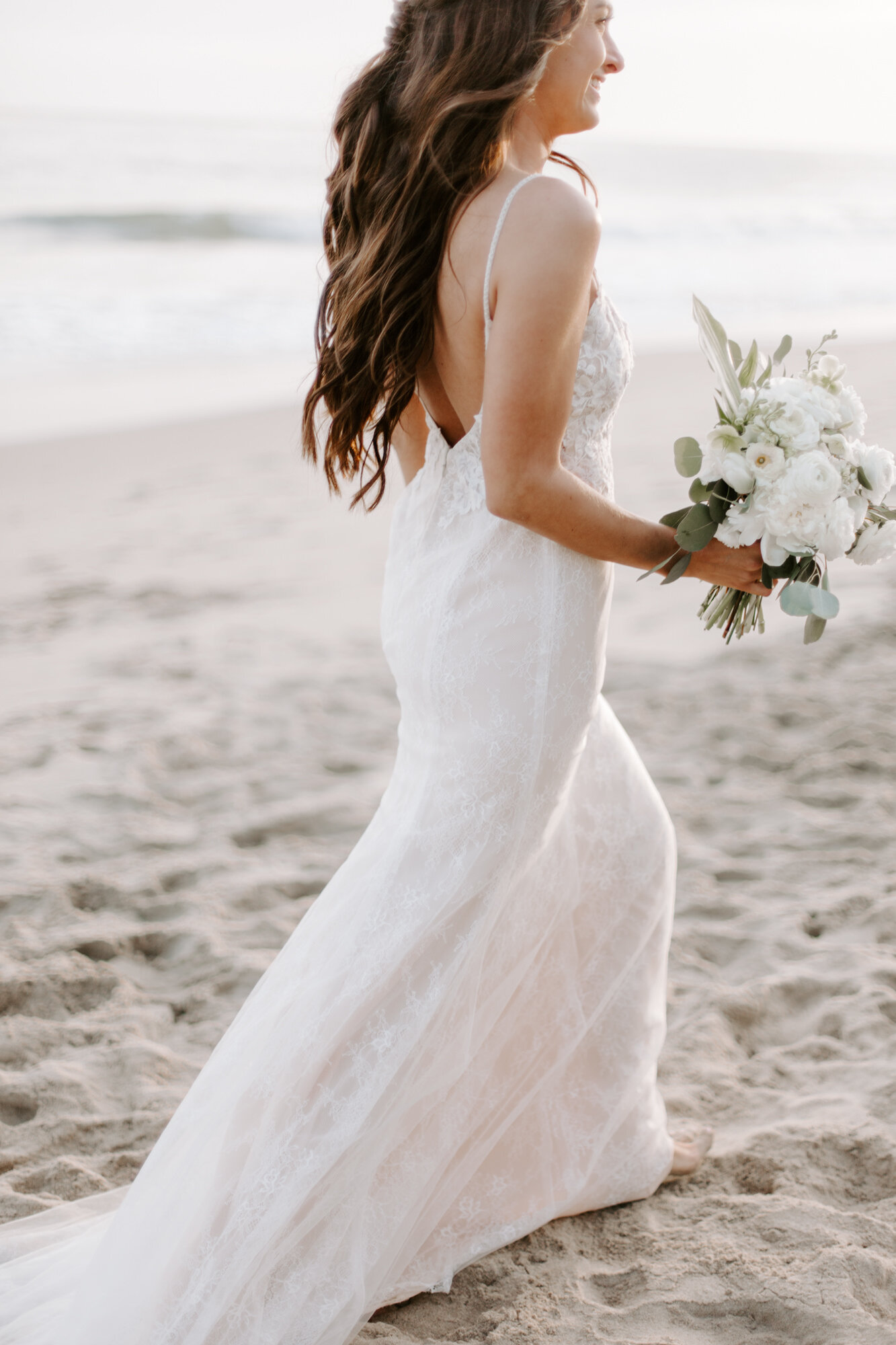 Malibu wedding photographed in Malibu california at a private home with a private beach.  Wedding photos were shot on the beach in Malibu.  This was a boho malibu wedding.  Malibu Wedding Photographer