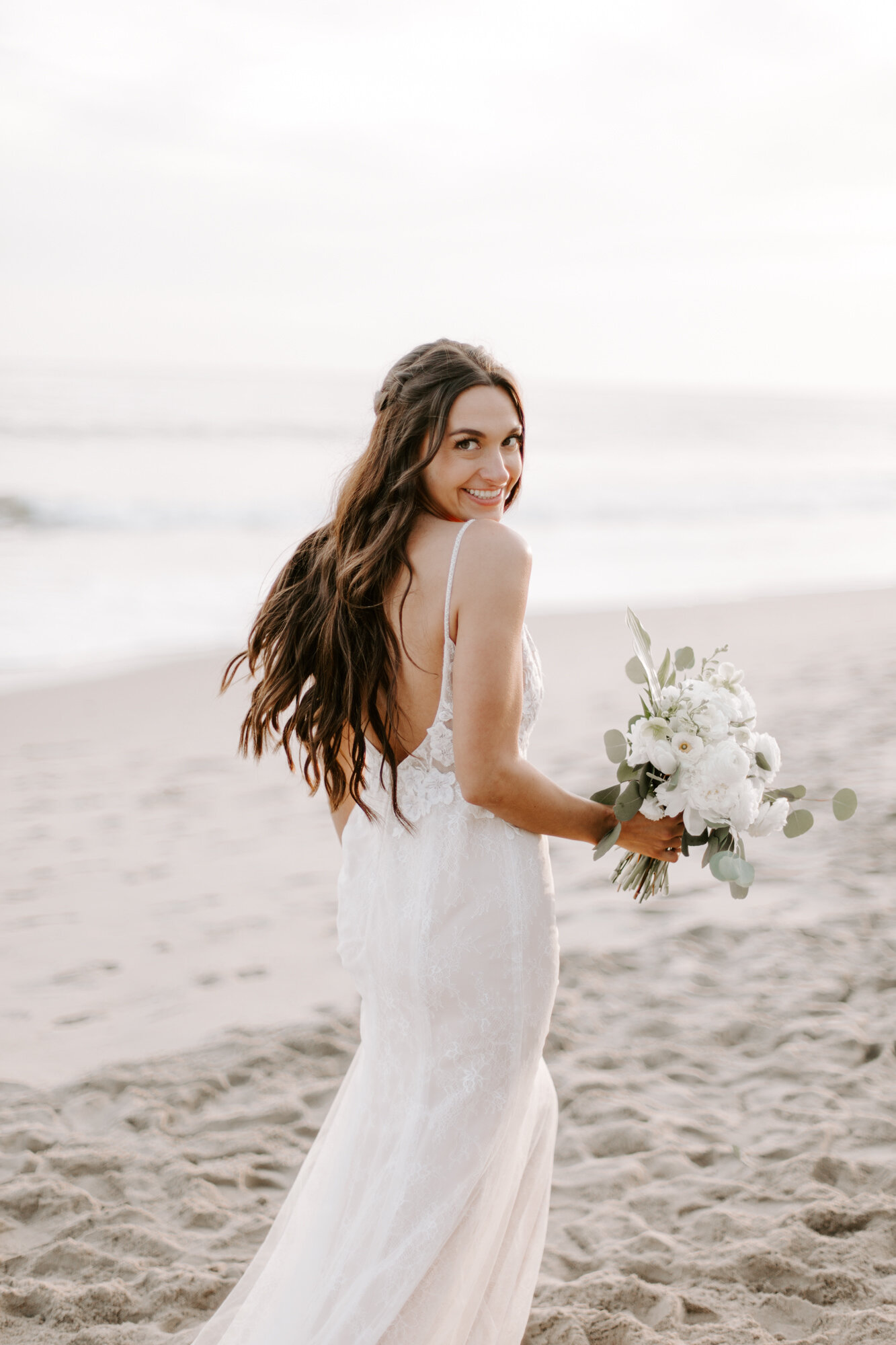 Malibu wedding photographed in Malibu california at a private home with a private beach.  Wedding photos were shot on the beach in Malibu.  This was a boho malibu wedding.  Malibu Wedding Photographer