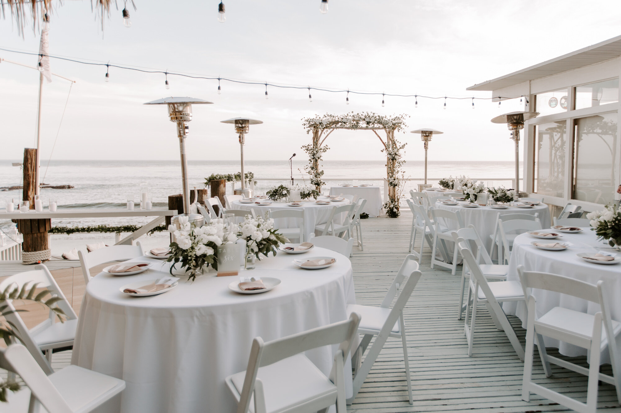 Malibu wedding photographed in Malibu california at a private home with a private beach.  Wedding photos were shot on the beach in Malibu.  This was a boho malibu wedding.  Malibu Wedding Photographer