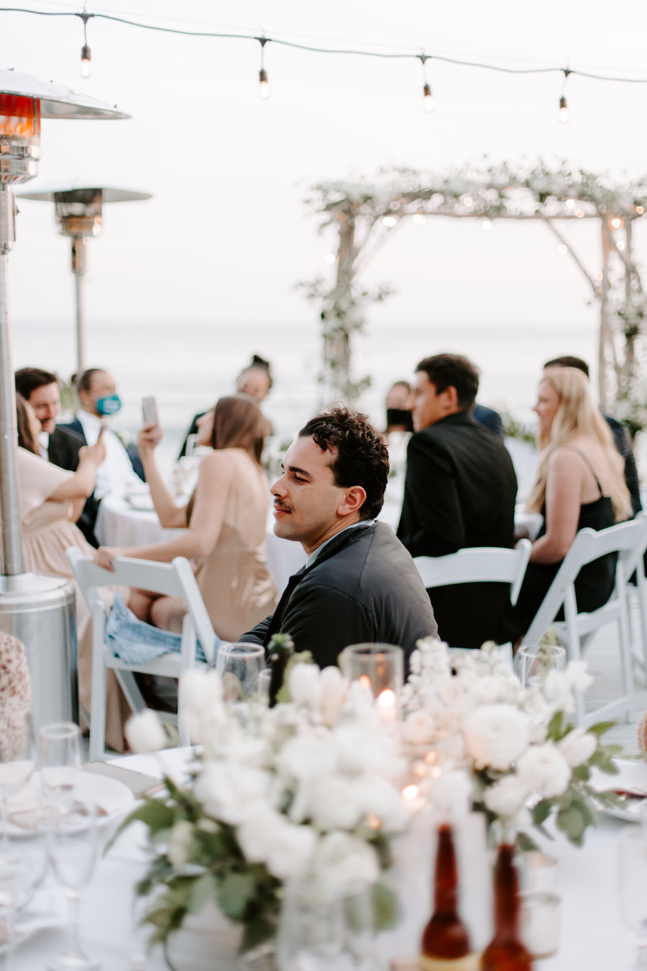 Malibu wedding photographed in Malibu california at a private home with a private beach.  Wedding photos were shot on the beach in Malibu.  This was a boho malibu wedding.  Malibu Wedding Photographer