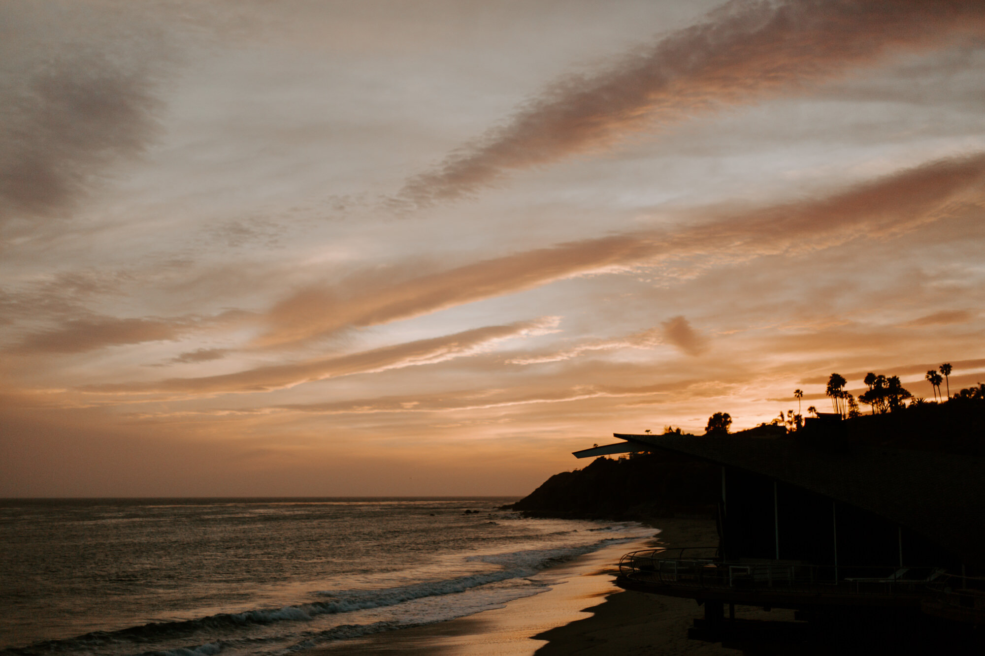 Malibu wedding photographed in Malibu california at a private home with a private beach.  Wedding photos were shot on the beach in Malibu.  This was a boho malibu wedding.  Malibu Wedding Photographer