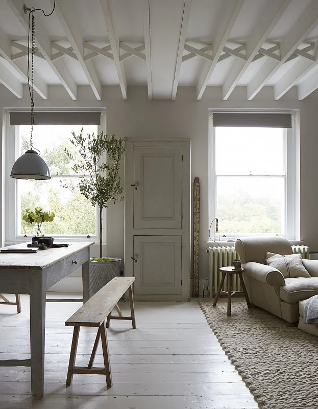 Maybe it's not everyone's cup of tea, but I love the all-neutral colour palette. The missmash of rustic textures keep it from looking sterile or unwelcoming.