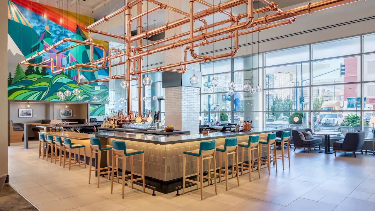 Hyatt-Regency-Denver-P260-FS-Bar-Bar-Turquoise-Chairs.16x9.webp