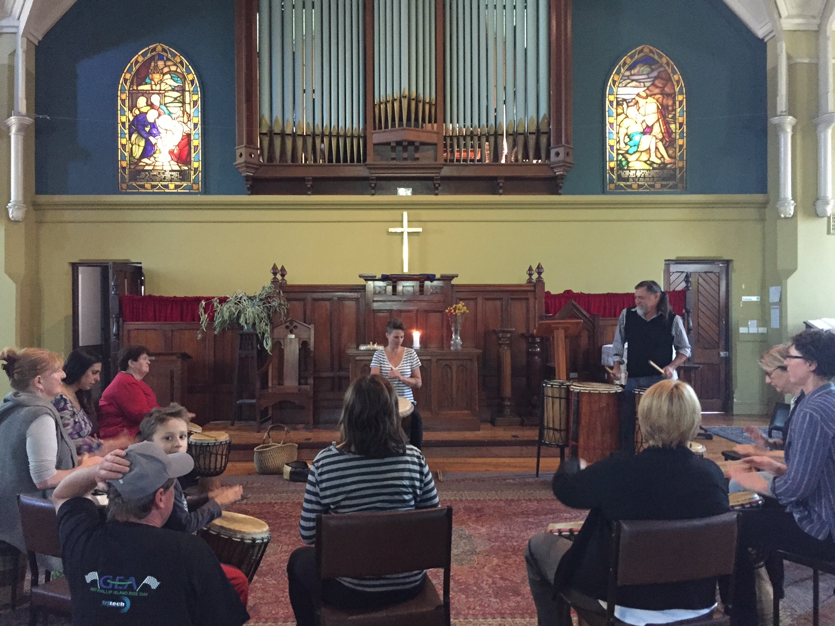 Simone Lang leads the Community Day workshop with African drums.