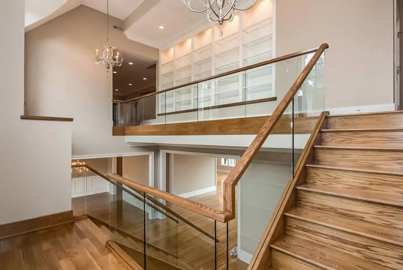 Glass and wood railing
CITATION Vis18 \l 1033 (Vision Stairways & Millwork)