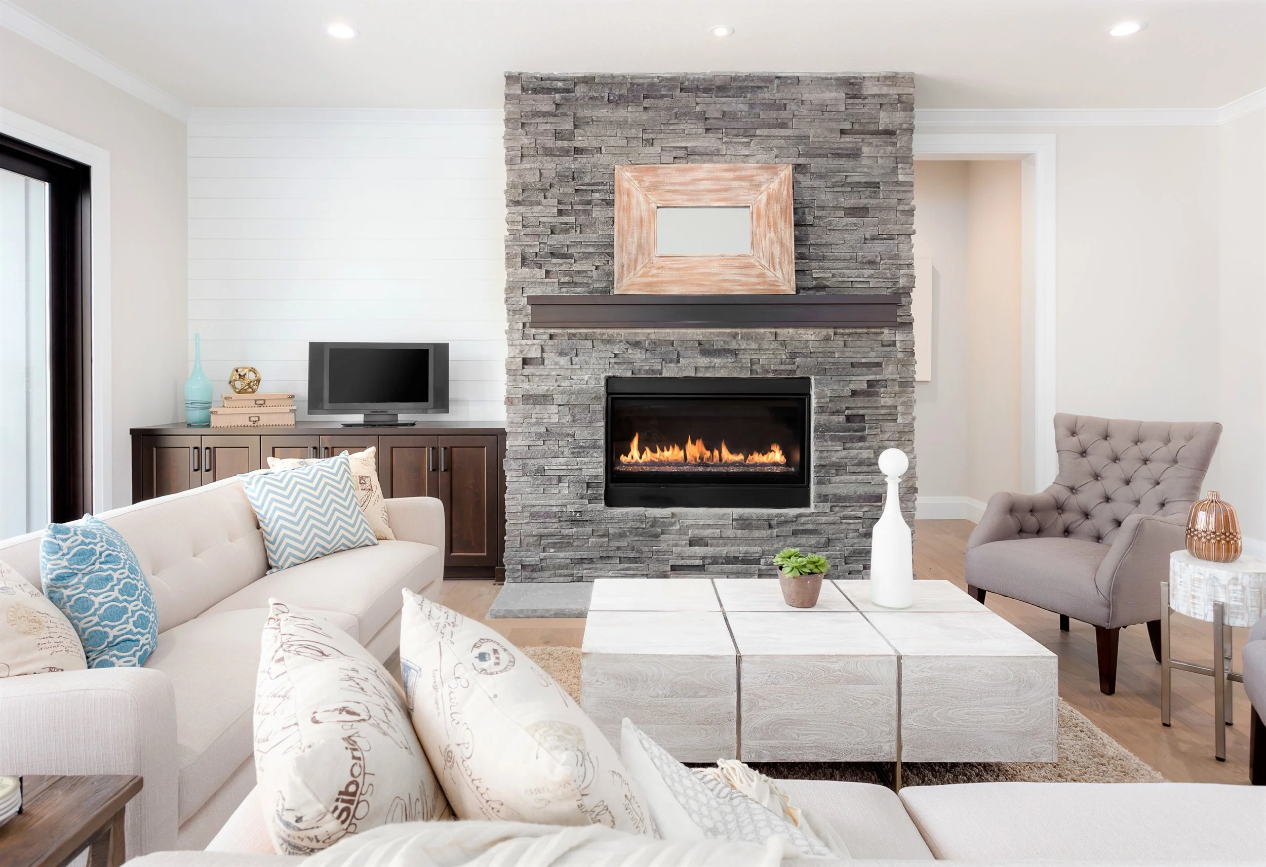 Family Room with stacked stone fireplace front view .jpeg