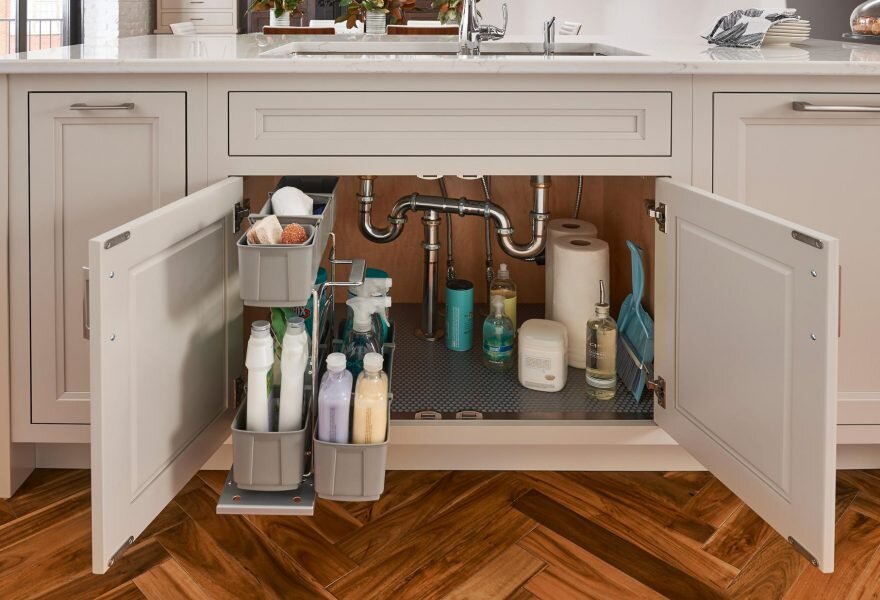 Sink Caddy   Make the most of your sink cabinet and add a spill mat and a pullout sink caddy. Make clean up a breeze.