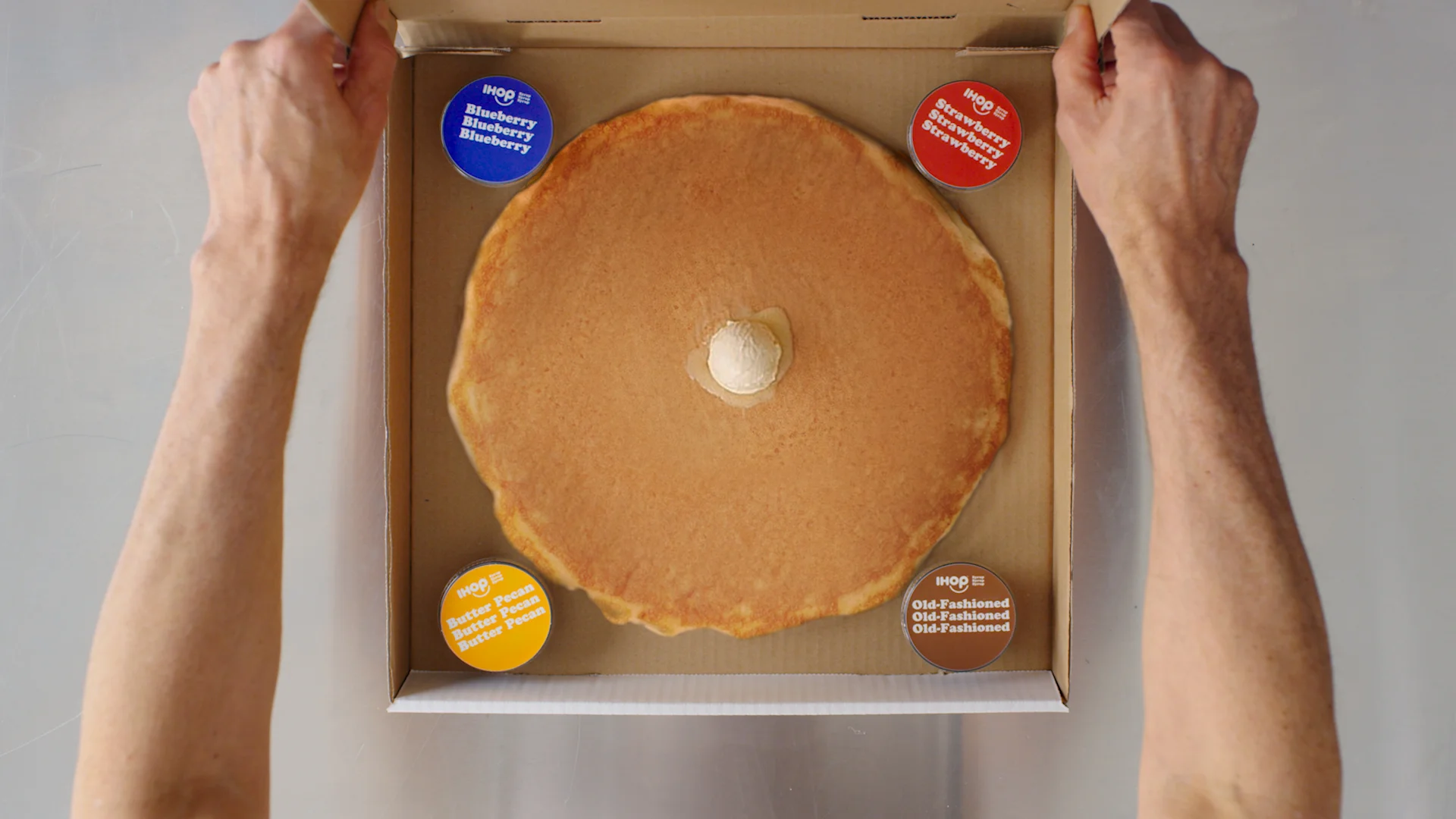 IHOP_Pancizza_BoxArms_JPG.jpg