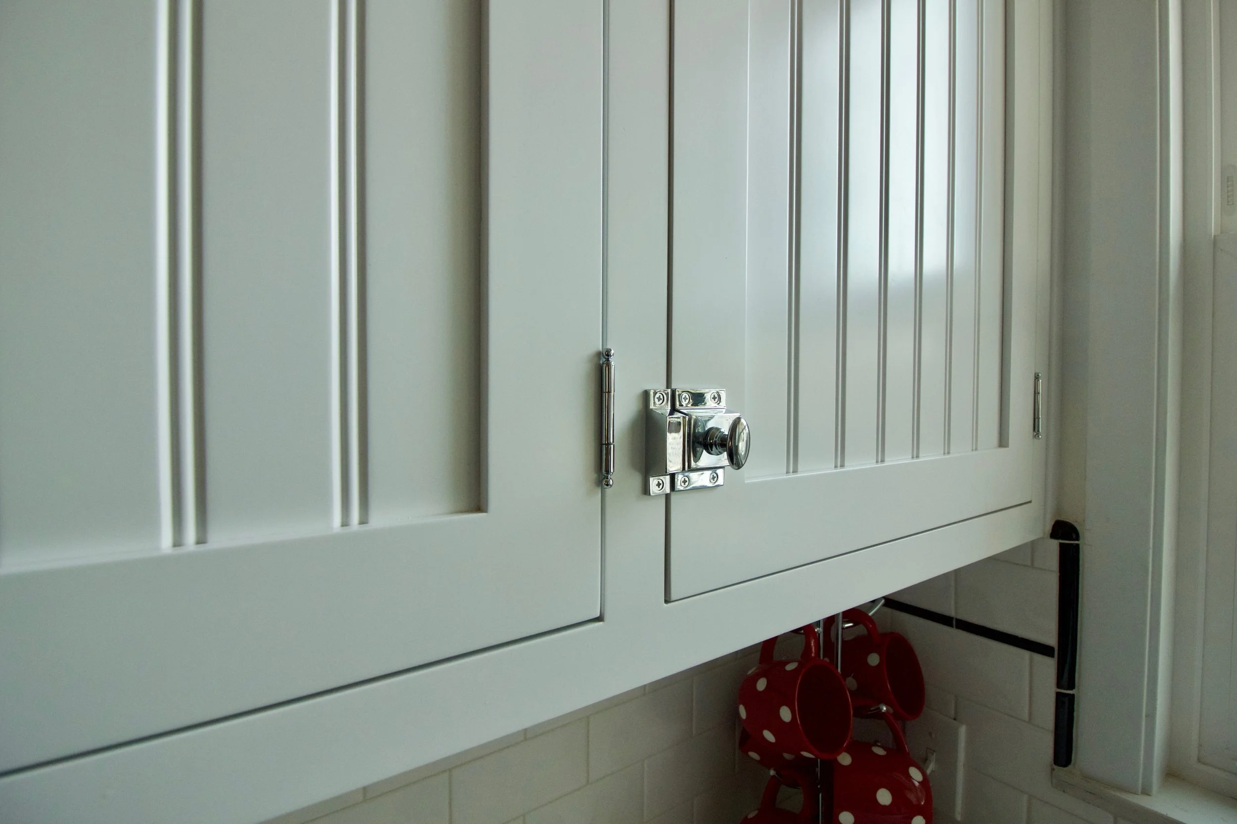 Inset face frame, flush fit drawers, and latches