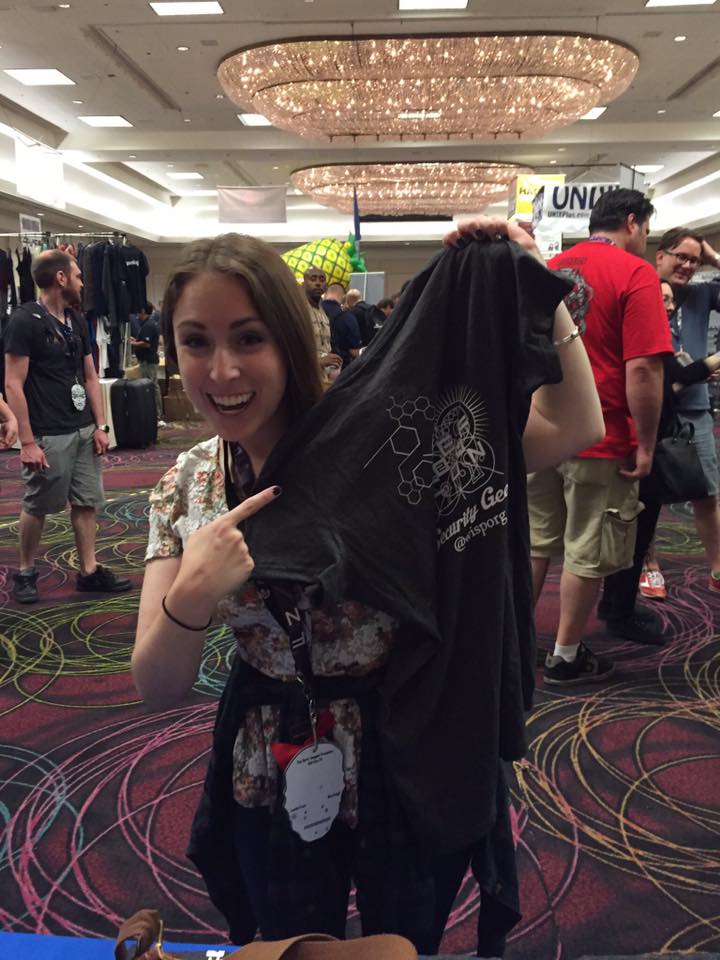 Rachel Tobac, second place winner of DEF CON 24's Social Engineering CTF, shows off her WISP DEF CON 24 swag.