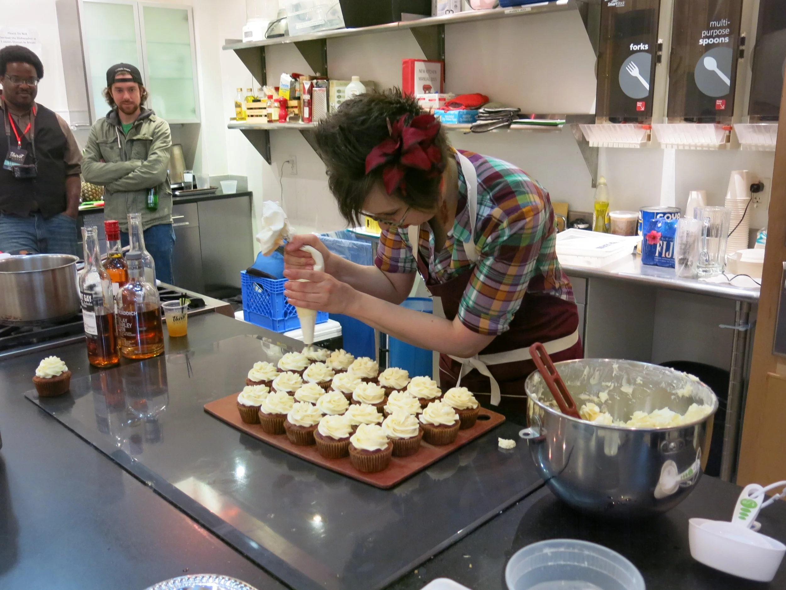 Pastry chef and bartender Kate Holowchik whips up carrot cake cupcakes with Mount Gay rum buttercream frosting in a seminar on making boozy pastries.