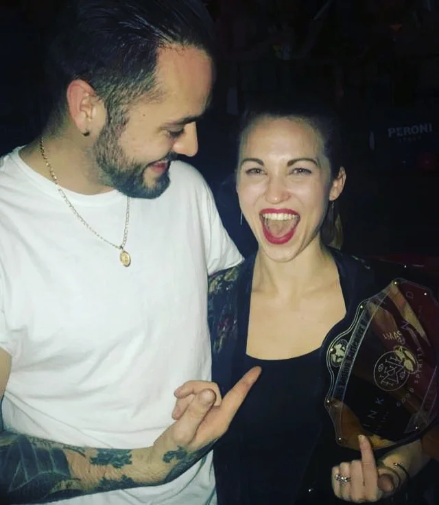 The champ, with husband Matt.