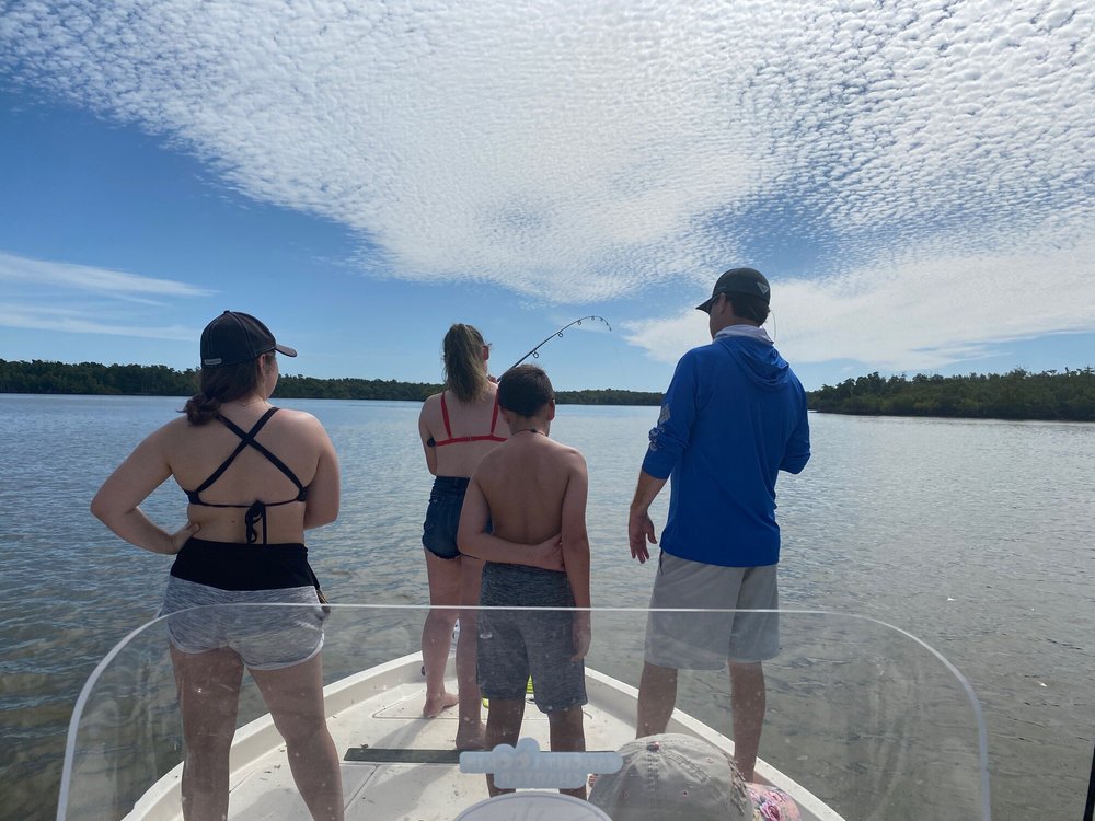 It took all of them to land a 200 Lb Lemon Shark