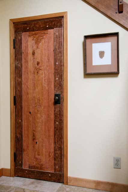handmade door from salvaged doug fir water tank boards
