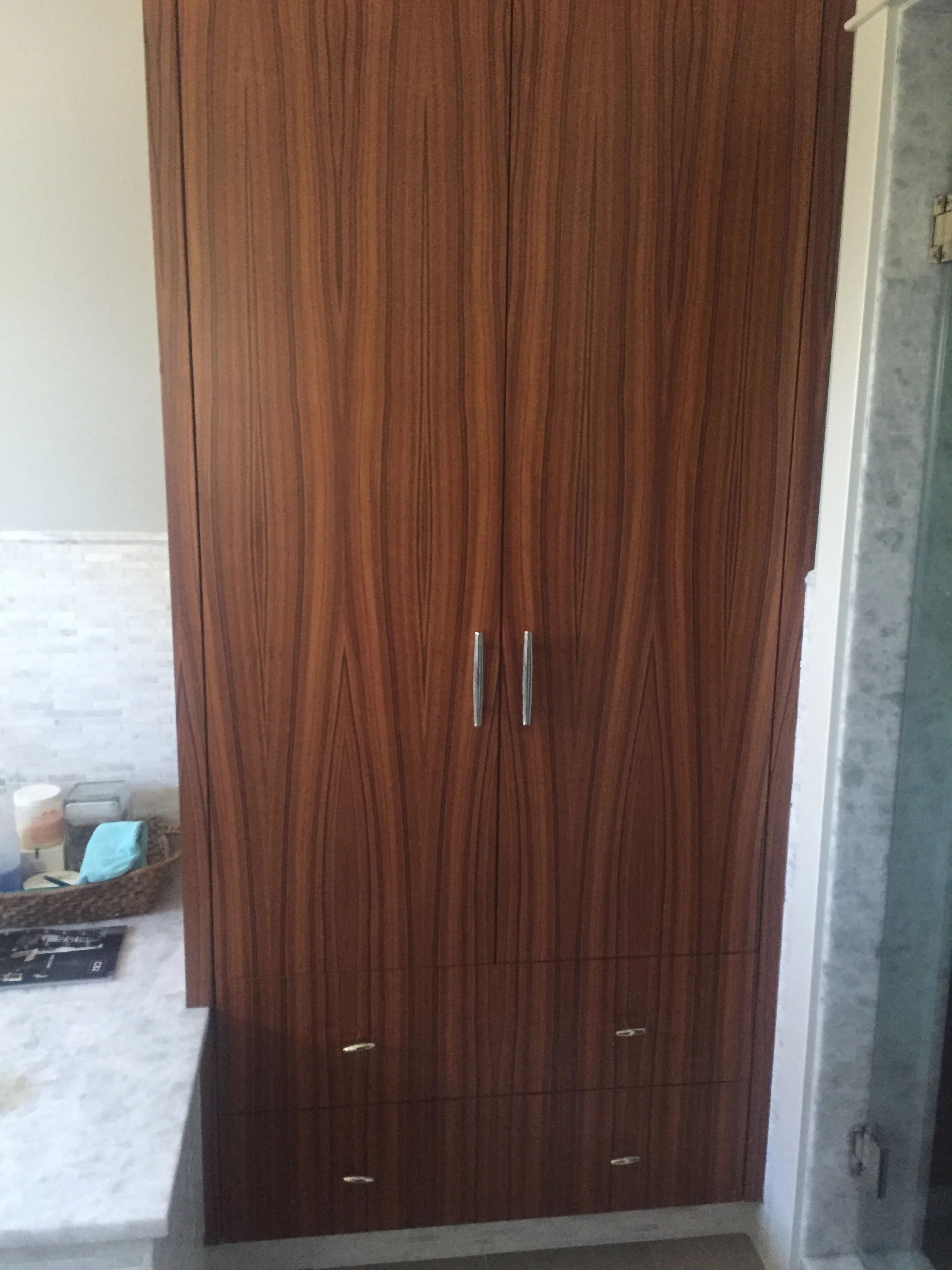  the simple natural beauty of mahogany cabinets, designed by Peter 