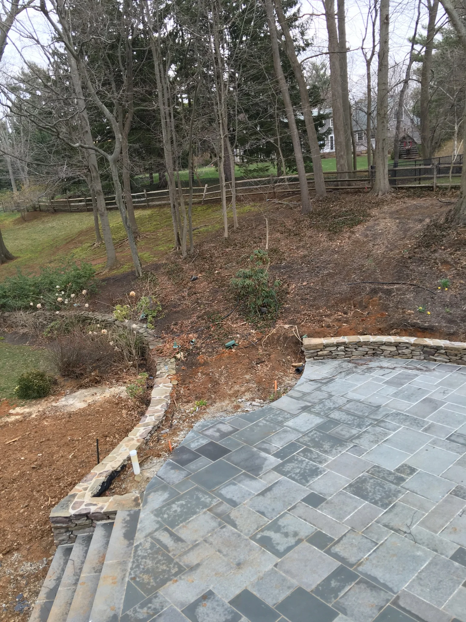  curved patio designed to embrace garden &amp; property 