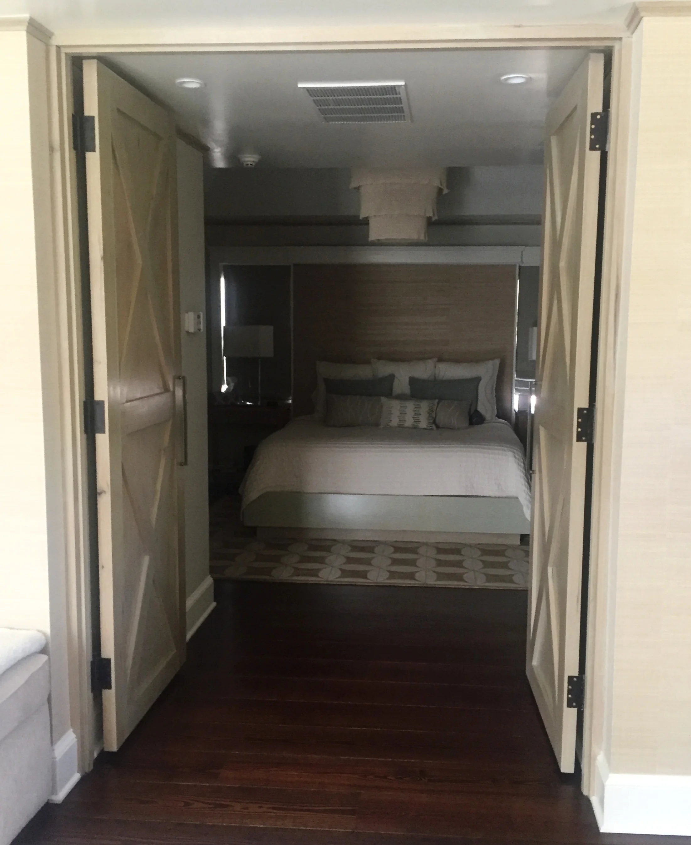  master bedroom with custom made butternut architect designed doors 