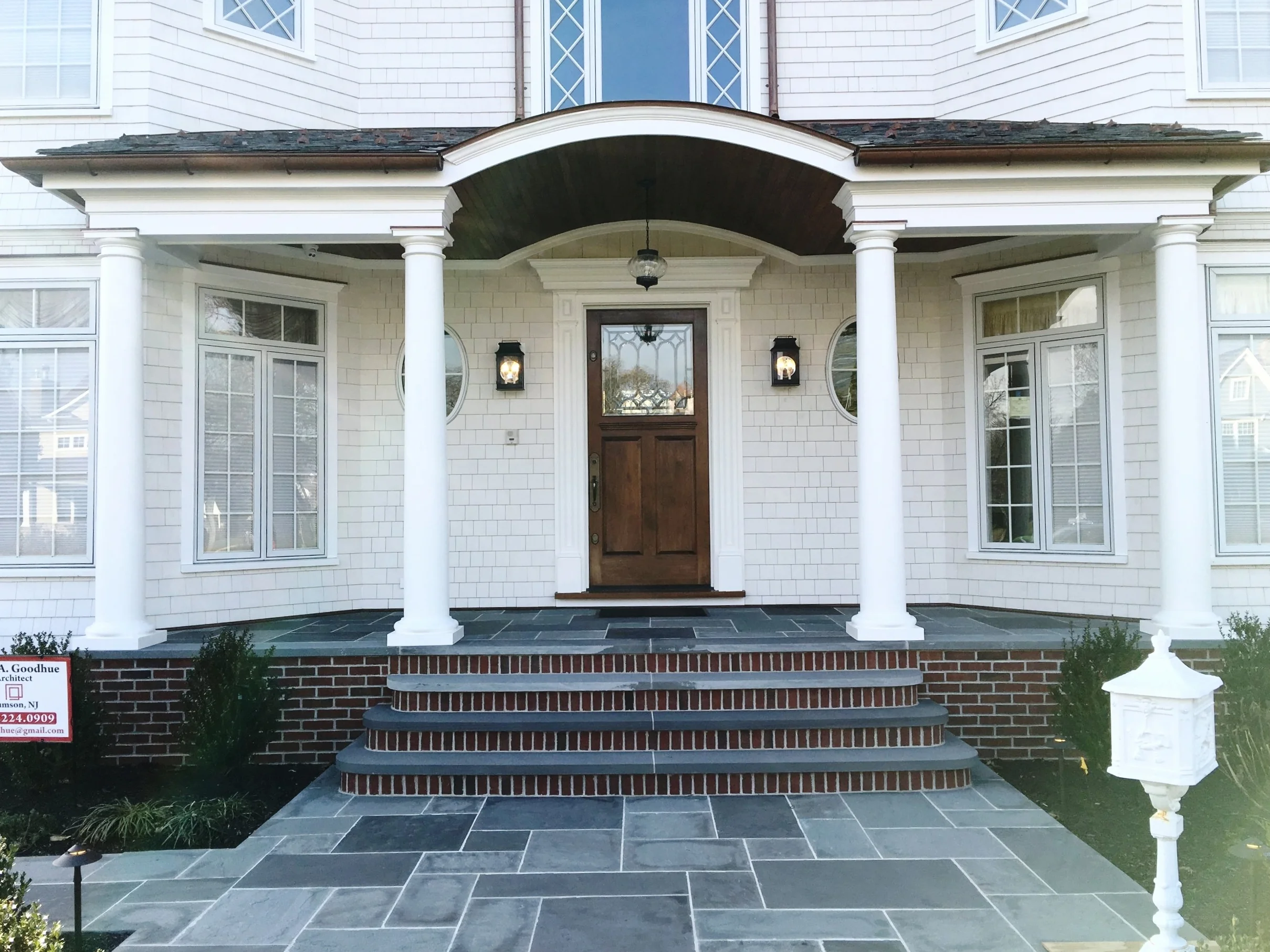  renovation with wooden shingles, new windows, trim &amp; front porch. Peter successfully convinced the town planning board to extend the front porch into the front yard to harmonize the house with the existing town homes. 