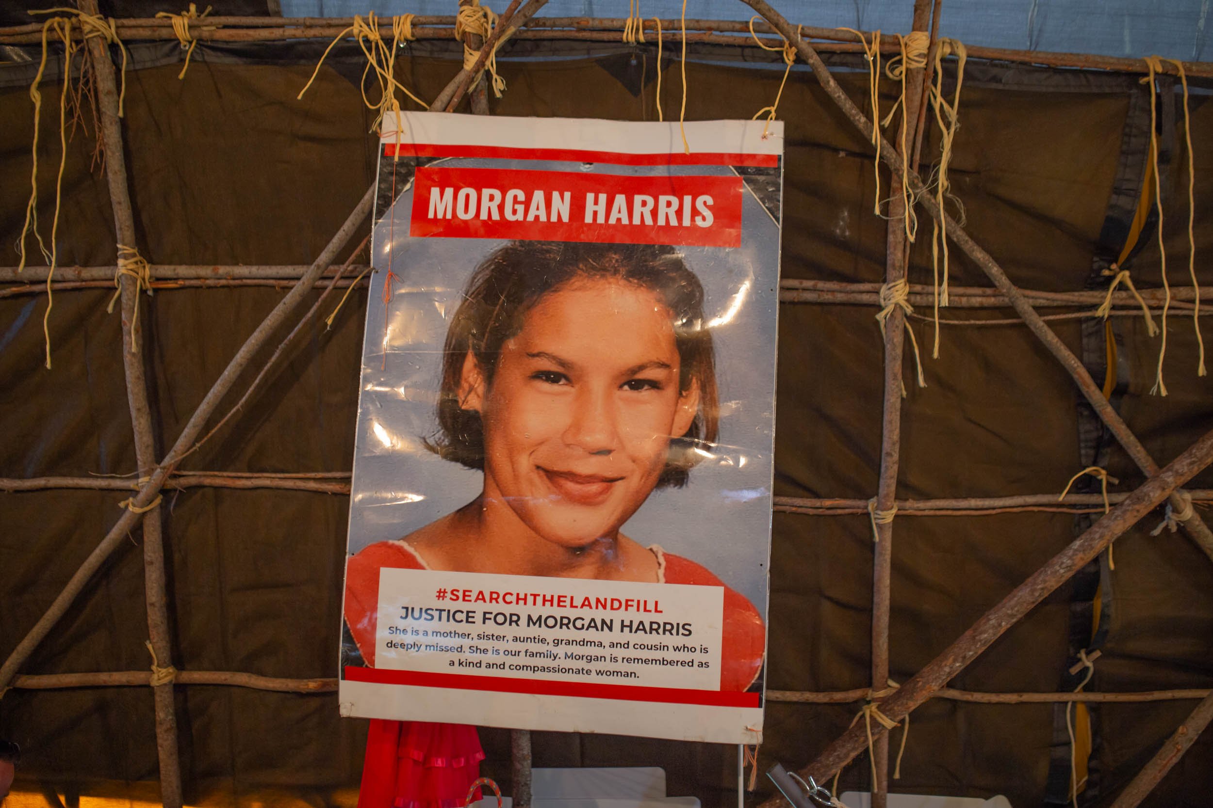  Inside a wigwam built by community members at Camp Morgan next to Brady Landfill, a large poster of Morgan Harris hangs amongst other protest signs and messages seeking justice. Harris was targeted and murdered in 2022 and her remains had still not 