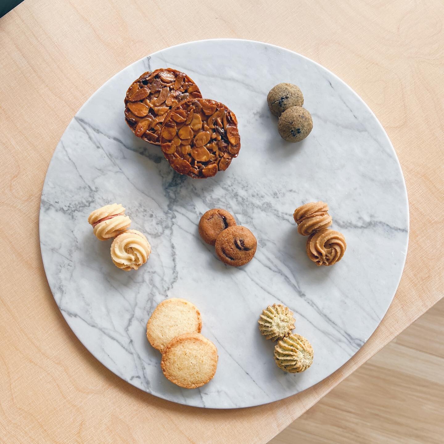 &lt;THE COOKIE BOX V.2&gt;

THREE brand new, off-menu cookies, only available in this box!

Burnt Honey Florentine 
Goma Boule de Neige 
Cranberry Viennese Whirls 
Coffee &amp; Speculoos Viennese Whirls 
Mini Chocolate Chip Cookies 
Pineapple Shortbr