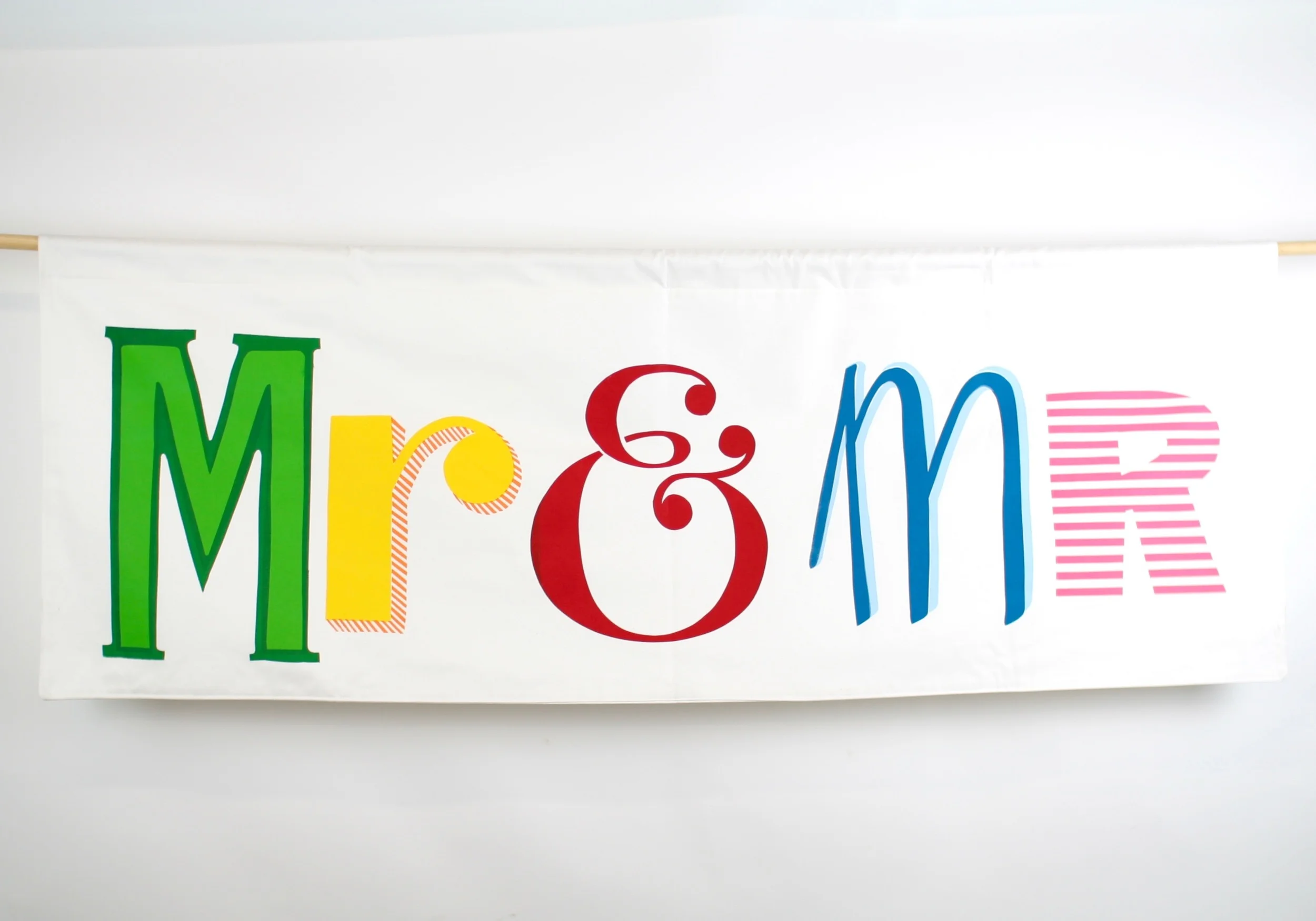 Hand screen printed banner measures 150 cm x 55 cm The banner is backed with the same soft brushed cotton as the front and each banner has an integral channel for the hanging pole. HIRE: £50 BUY: £150 BESPOKE: Prices from £250