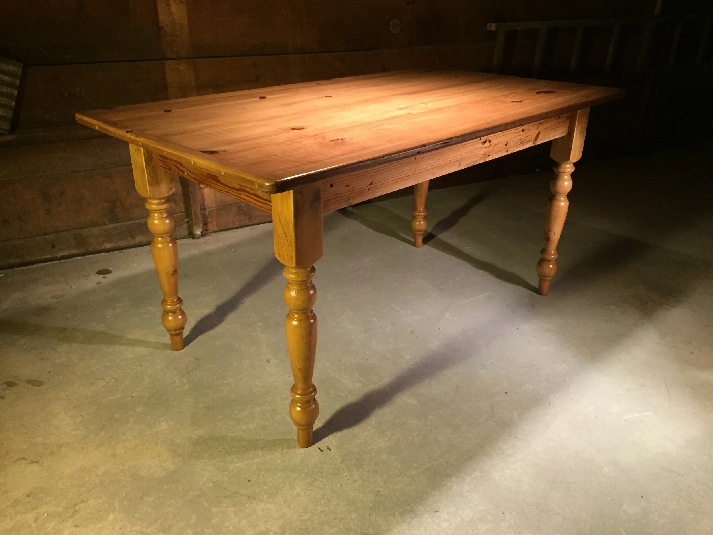 5' dining table with breadboards and American turned legs in a Golden Brown finish