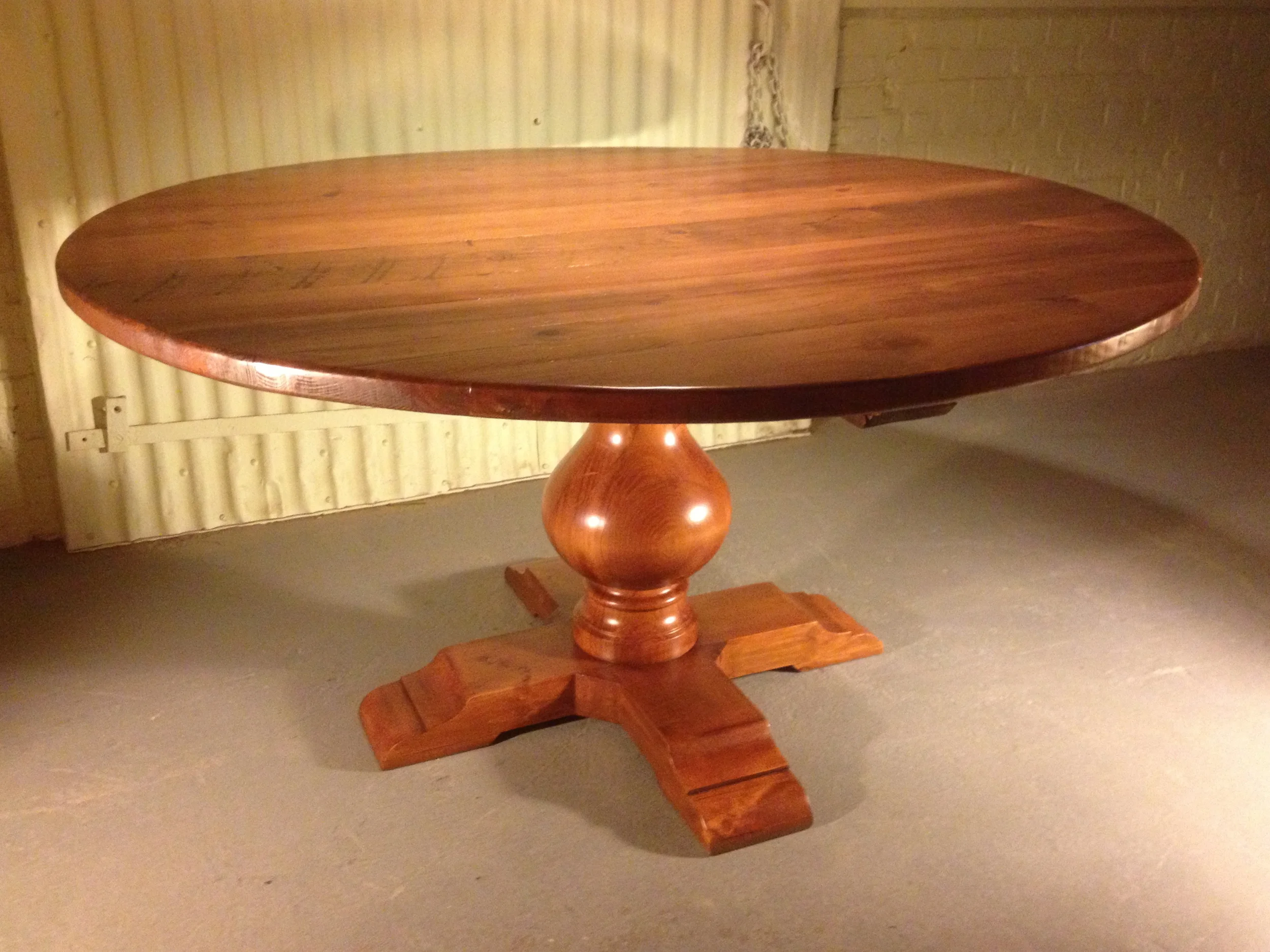 60" thick top round table with Grand Classic pedestal finished in Hazelnut