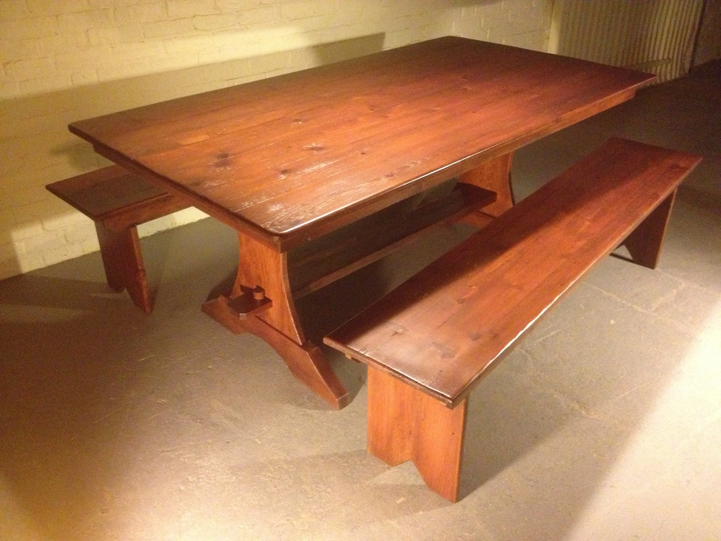 6' thin top Essex trestle with custom apron finished in Hazelnut with matching plank benches