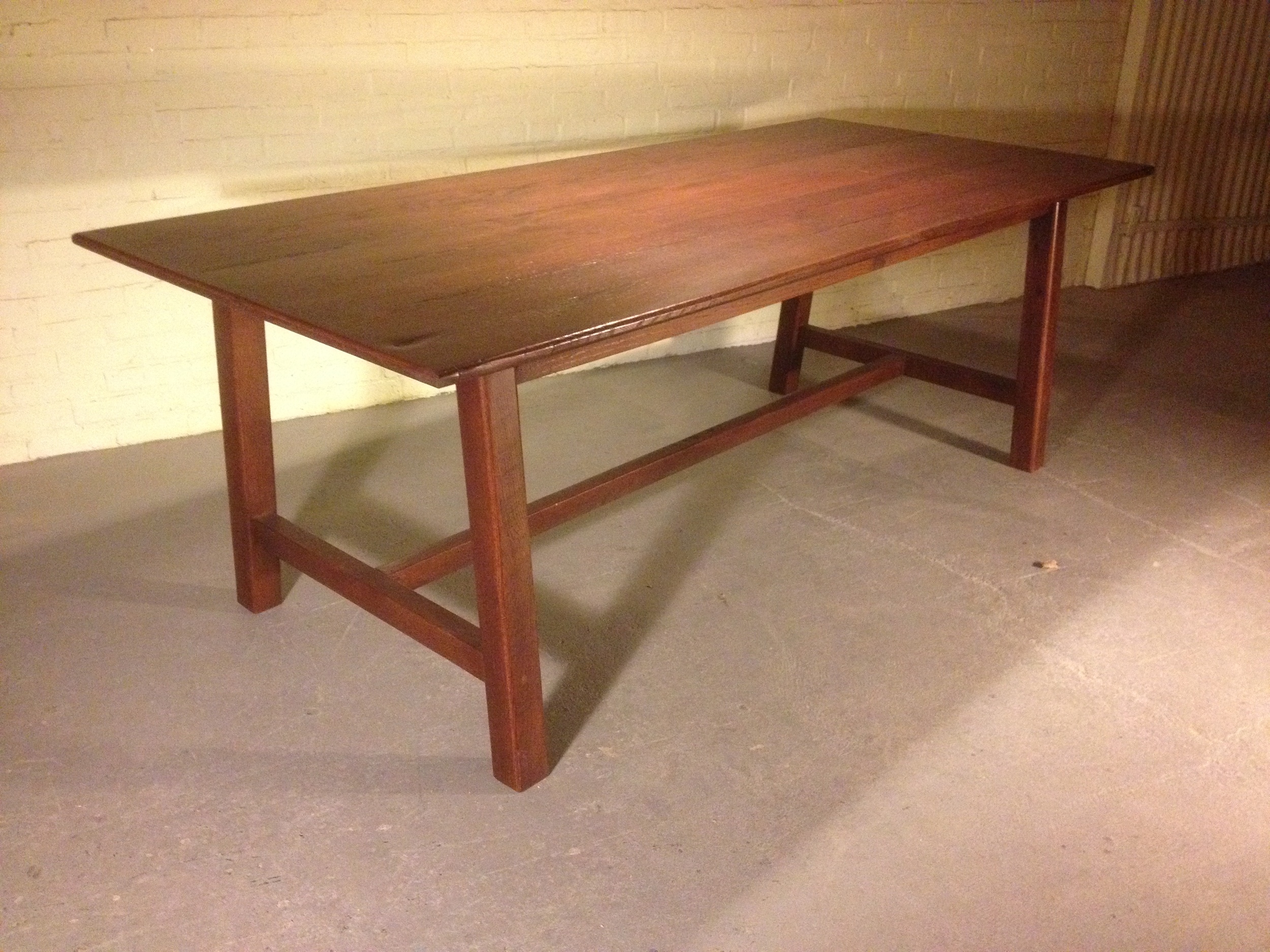8' thin top Splayed leg Refectory table finished in Mahogany