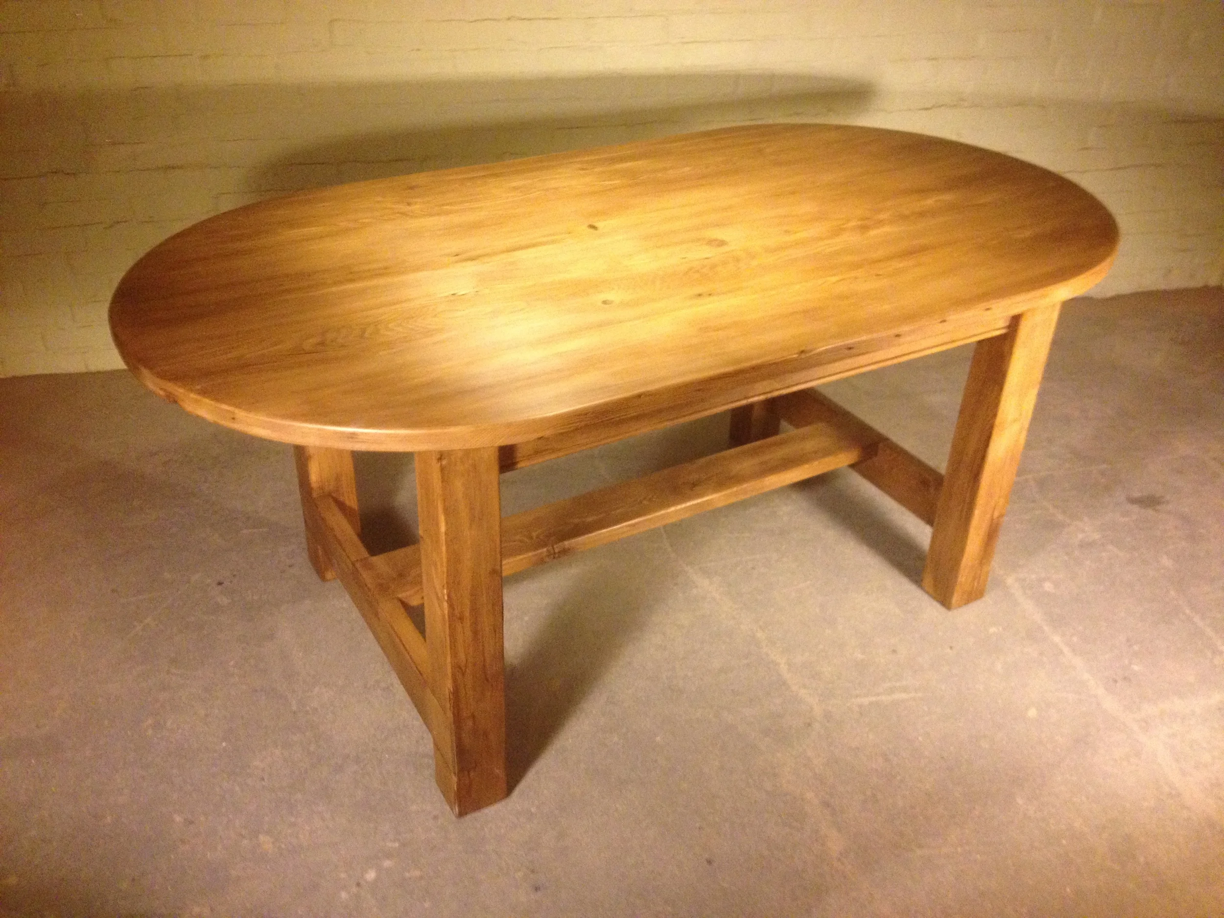6' thick top oval straight leg Refectory table finished in Stripped Pine wax