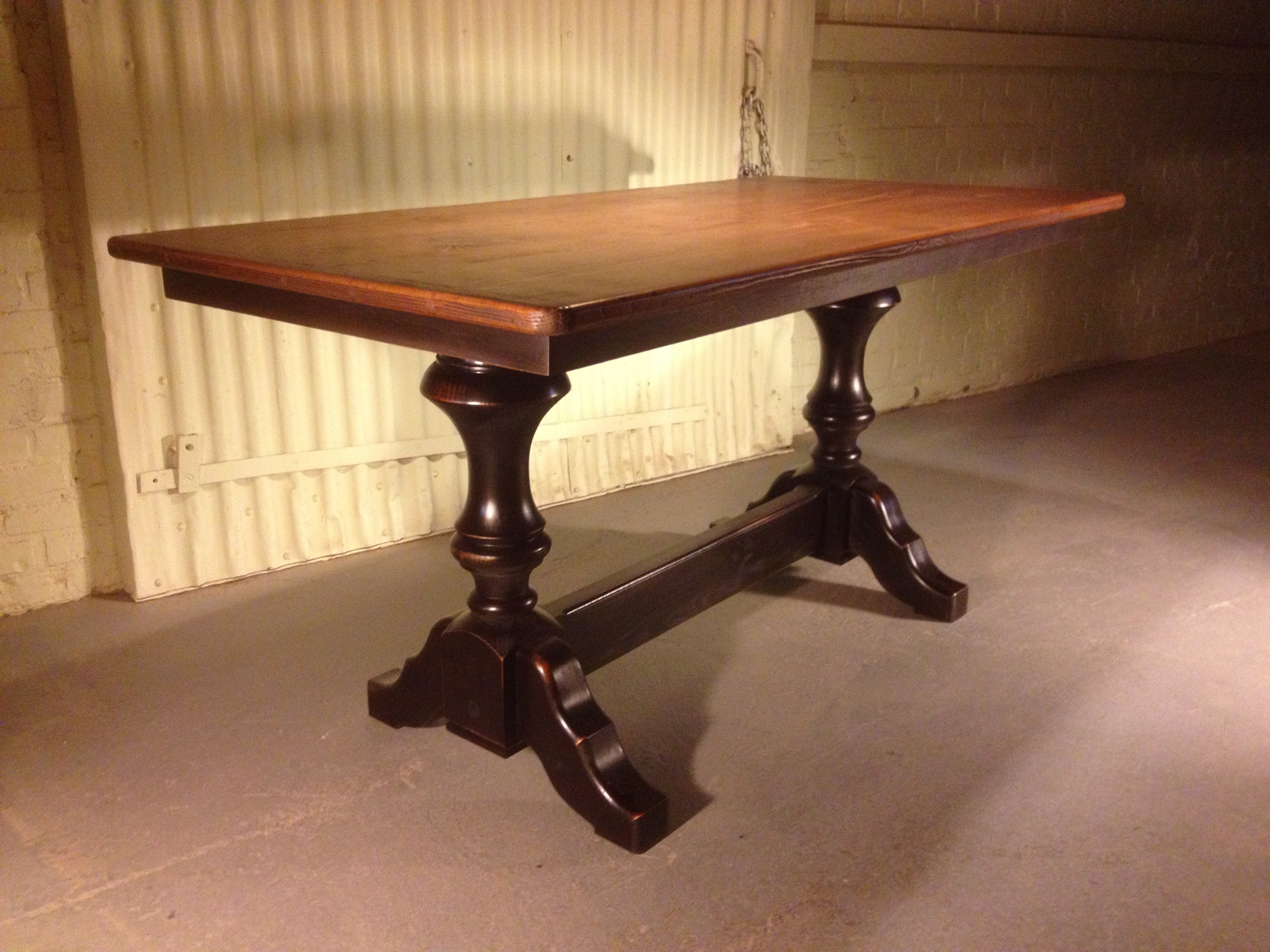 84"x37" thick top barnwood table with decorative apron and double Elegant pedestal finished in Black with a Hazelnut top