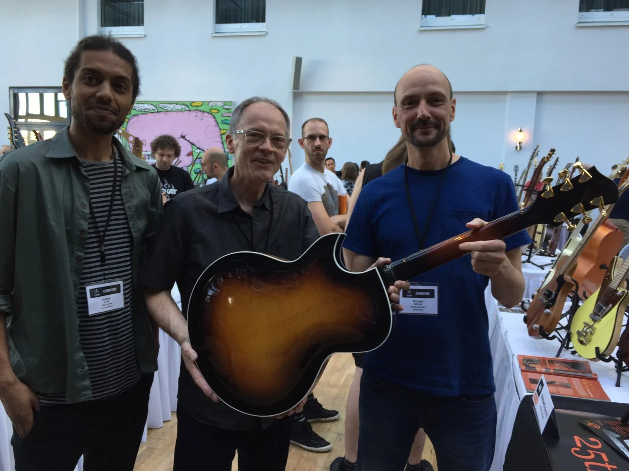 Joseph Case & Jon Case admiring the wonderful archtops made by Richard Heeres