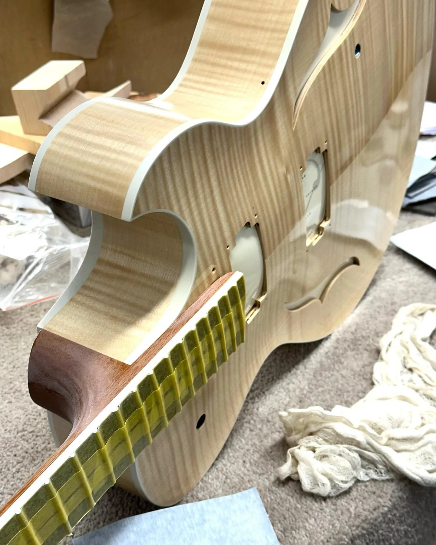 Beautiful blonde J3 Florentine having its clear coats applied. #caseguitars #archtopguitar #luthiers #georgebenson #offsetguitar