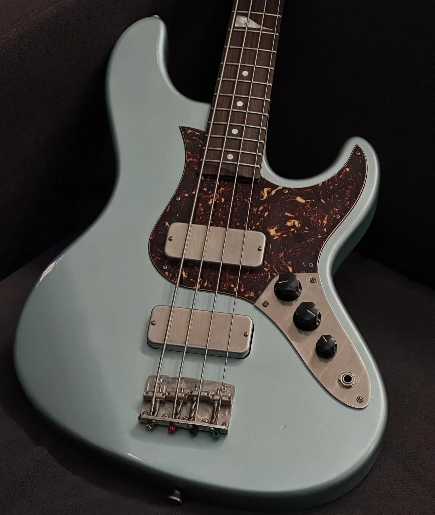 Custom spec of our BJZ bass. Road worm, low lustre ice blue metallic finish. @mojopickups Thunderbird pickups. Medium scale, ultra comfy slim c profile neck. #queensofthestoneage #bassist #caseguitars