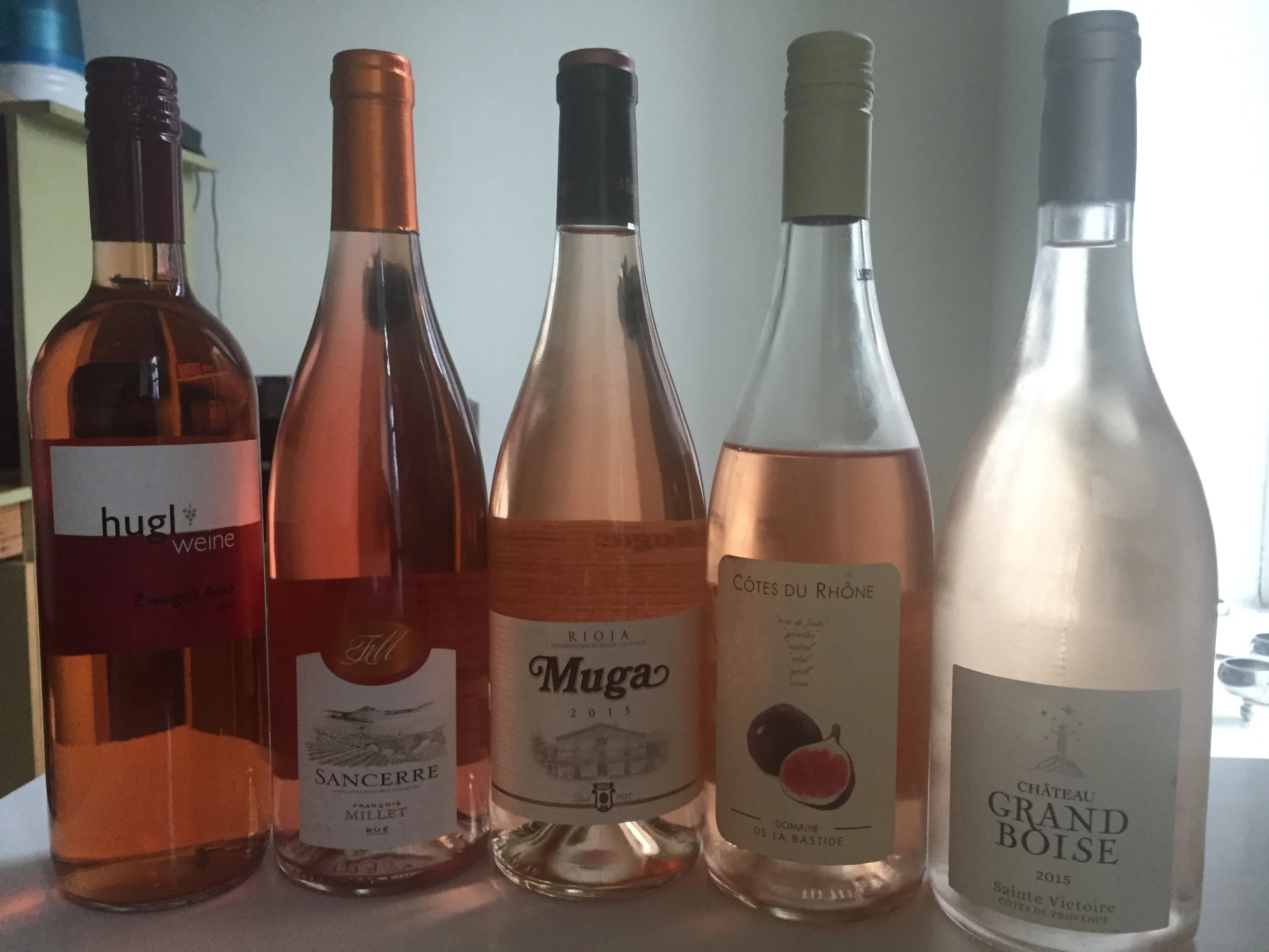 The many shades of pink wine (ignore the fact that one of them has clearly already been opened) | New York | June 2016