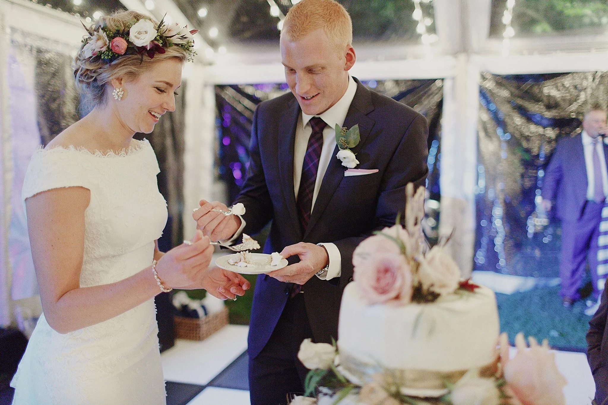 Blythefield Country Club Elegant Tented Wedding Bride and Groom Cutting Cake