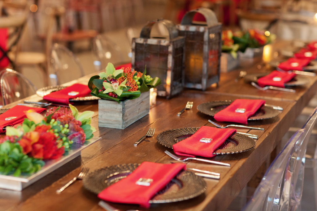 Tanger Outlet Grand Opening Table Design with Floral Arrangement
