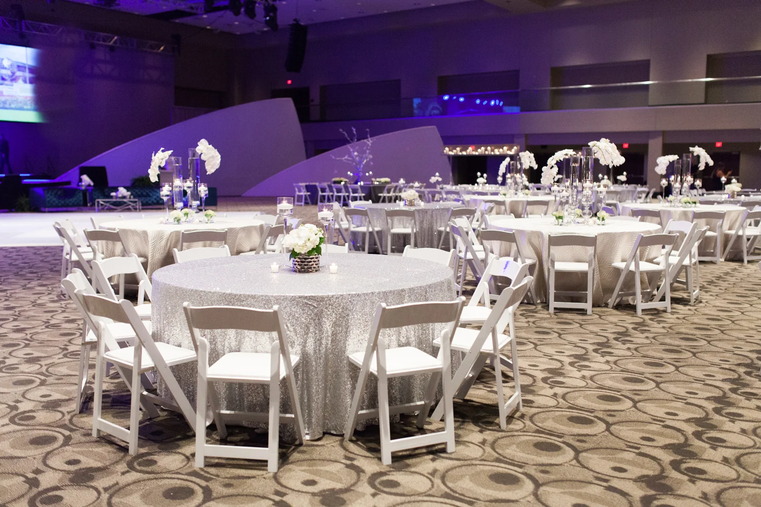 Grand Rapids, Michigan Ballroom Event with White Tables and Chairs