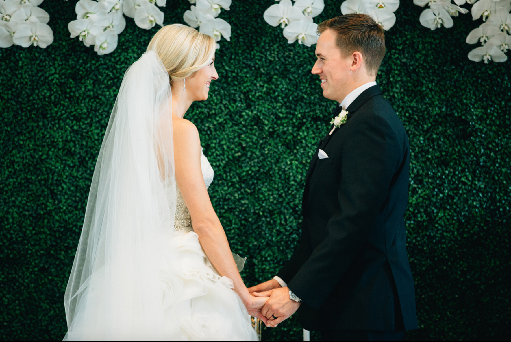 West Michigan Wedding Cute Photo of Bride and Groom During Ceremony