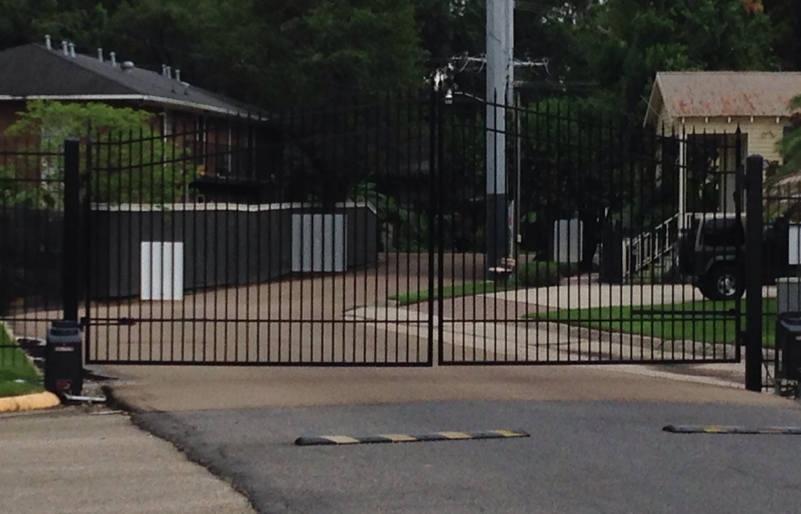 Gated road access as Tiger Manor Apartments