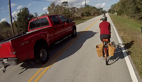 Driver obeying Louisiana law giving riders at least 3' of space.