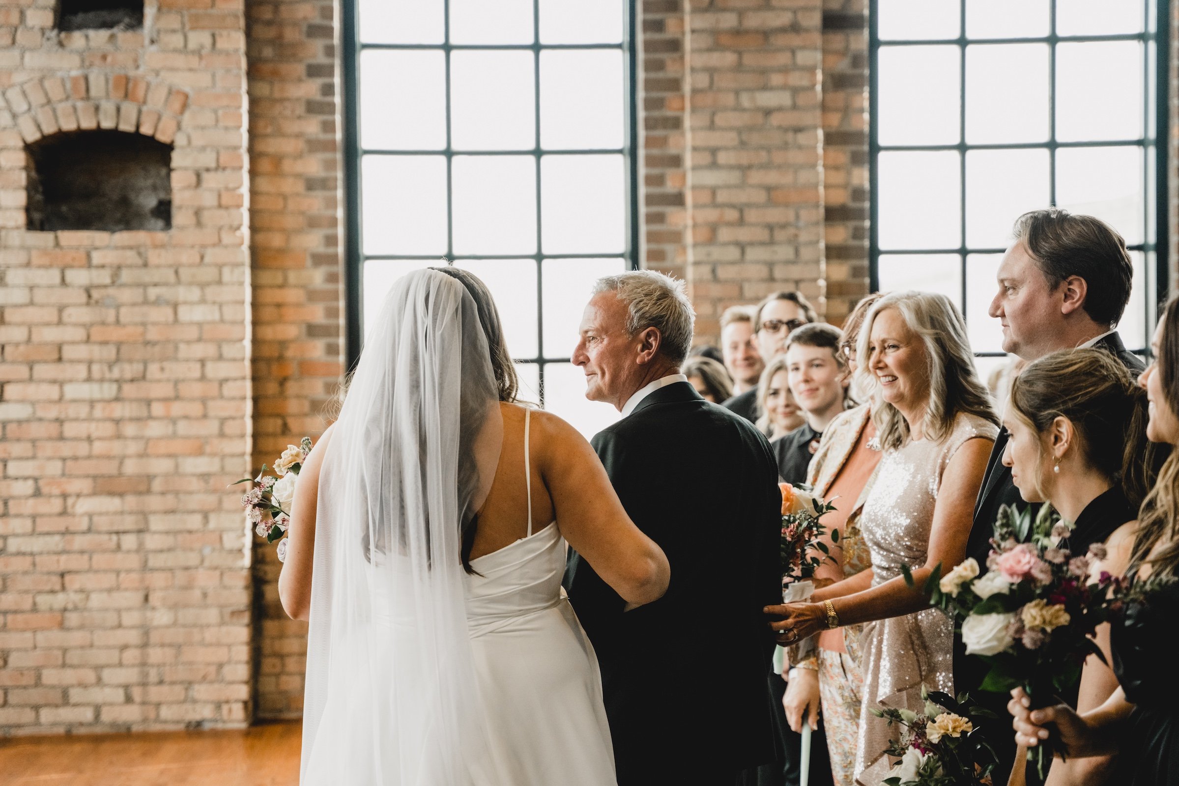 engle-olson-sam-colton-wedding-essence event center-previews- (33 of 49).jpg