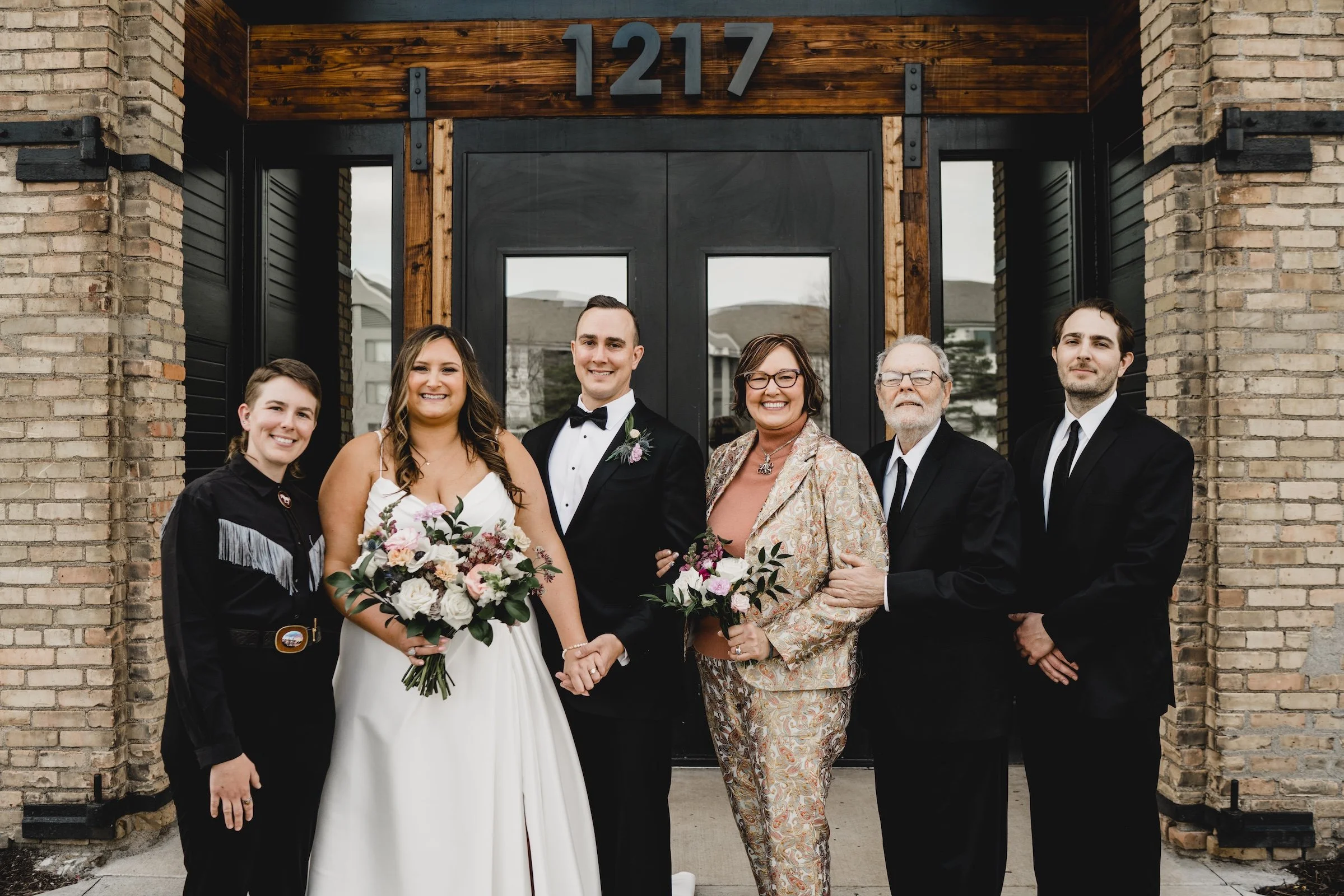 engle-olson-sam-colton-wedding-essence event center-previews- (37 of 49).jpg