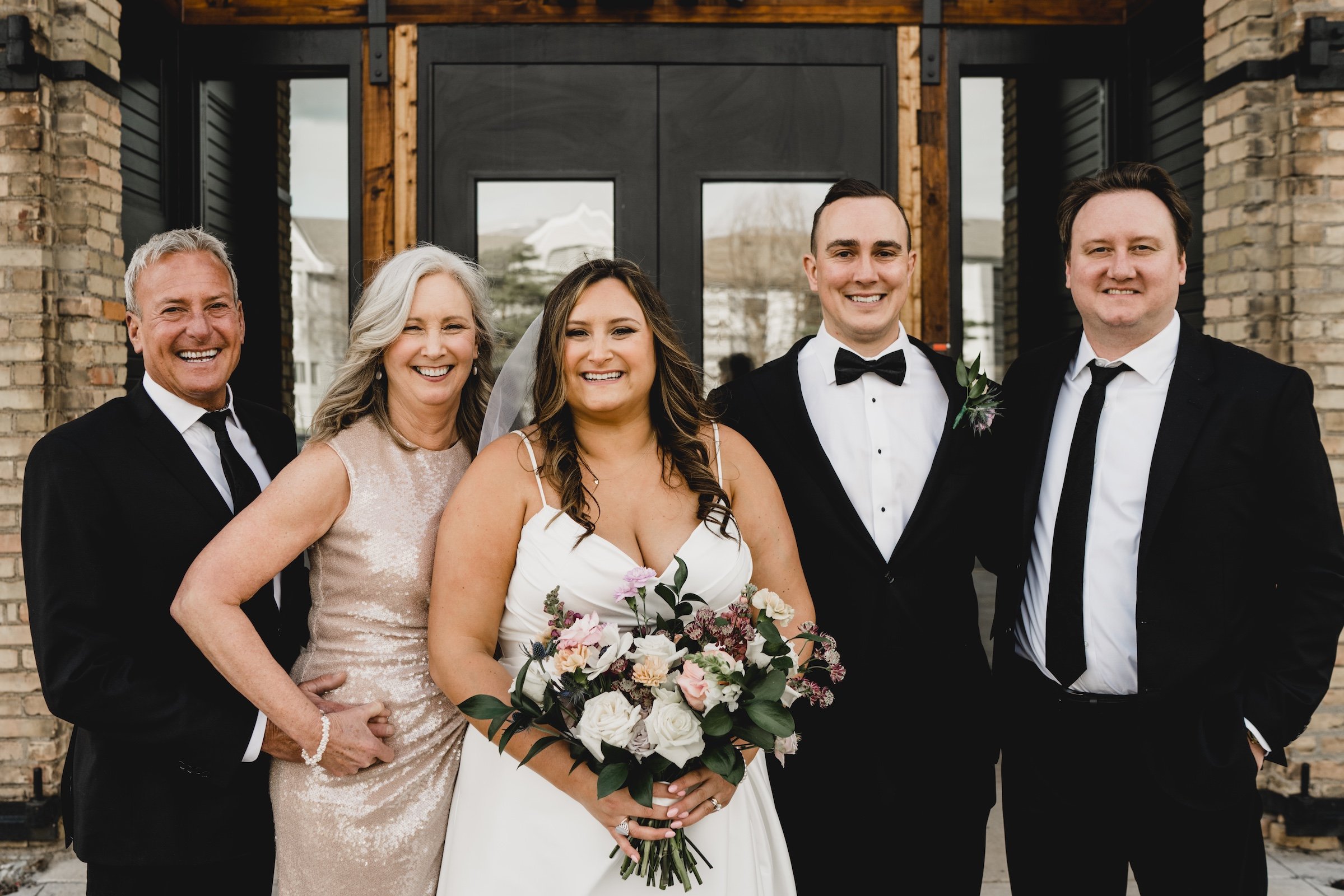 engle-olson-sam-colton-wedding-essence event center-previews- (39 of 49).jpg