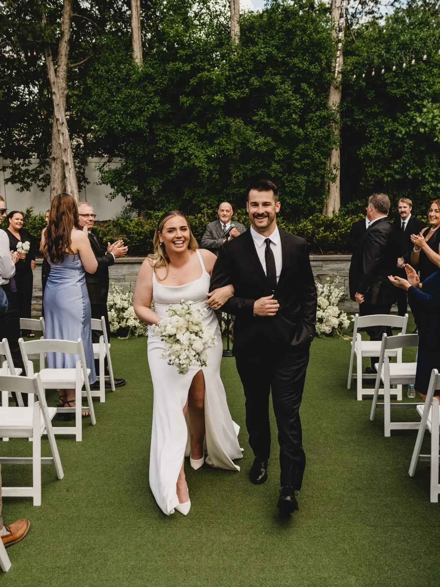 The couple ➡️ ➡️ ➡️⁠
The vibes 🖤 🌿 🎶 🍾⁠
⁠
⁠
Leah + Joe⁠
venue :: @thehuttonhouse⁠
coordinator :: @chaseweddingsandevents⁠
dj :: @bennynord⁠
hair + makeup :: @taylormariebeautyllc⁠
gown :: @aandbe_mpls⁠
dance floor :: @woodburyeventrentals⁠
cateri