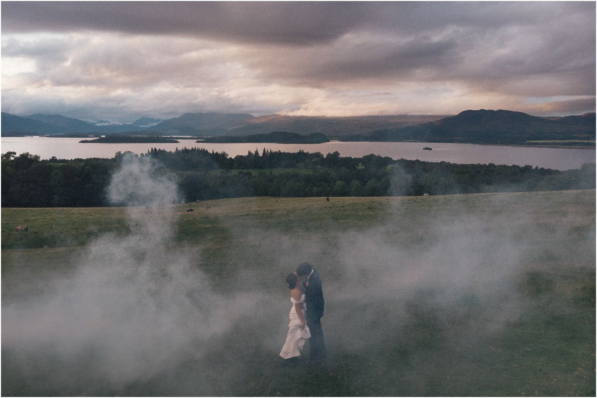  Wedding couple portraits in the sunset and fog on top of a mountain in the evening by Cro & Kow 