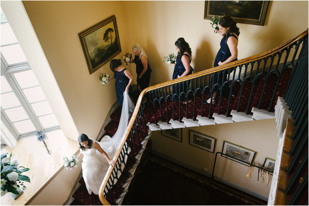  Bride going down the Blairquhan castle staircase by Cro & Kow 