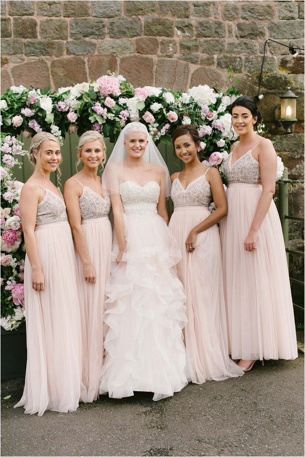  Bride and bridesmaids during a wedding at The Ashes Barns in Staffordshire in England 